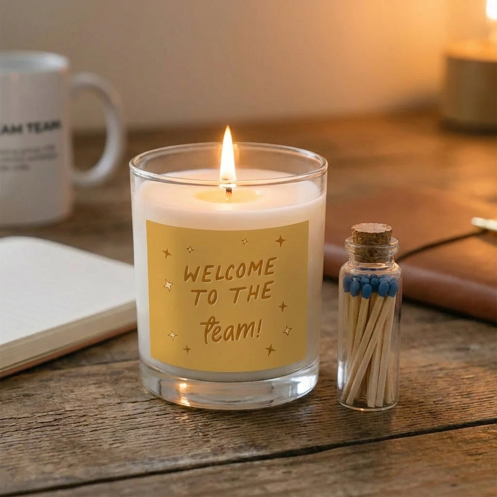 Welcome to the Team Gift Box + Logo Sweatshirt - candle with welcome message and matches on a desk.